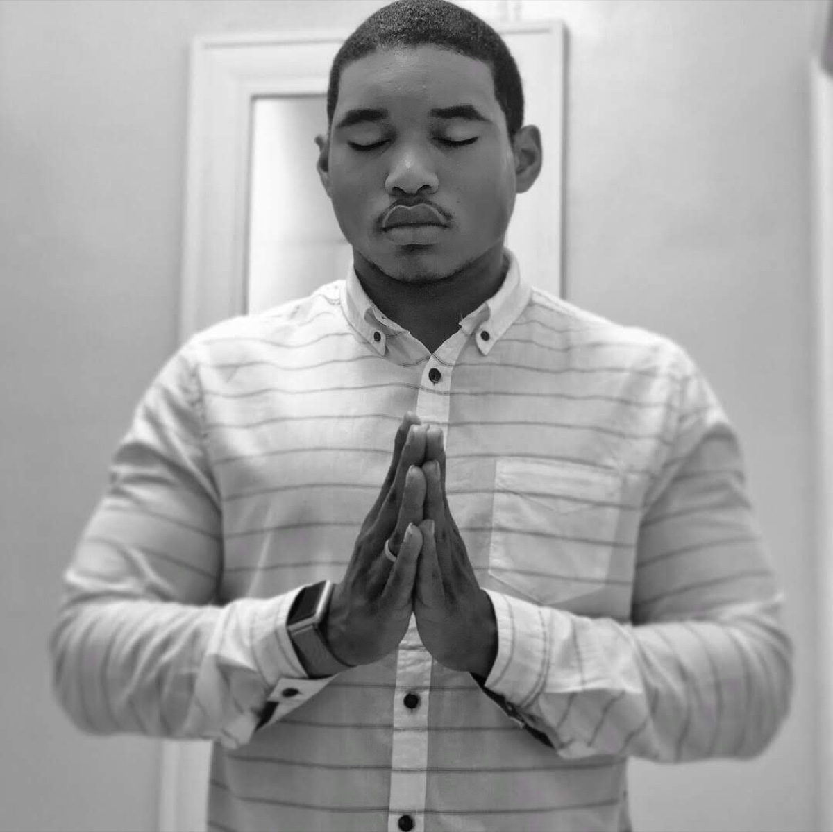 Paul DeShield (Eminence) in prayer